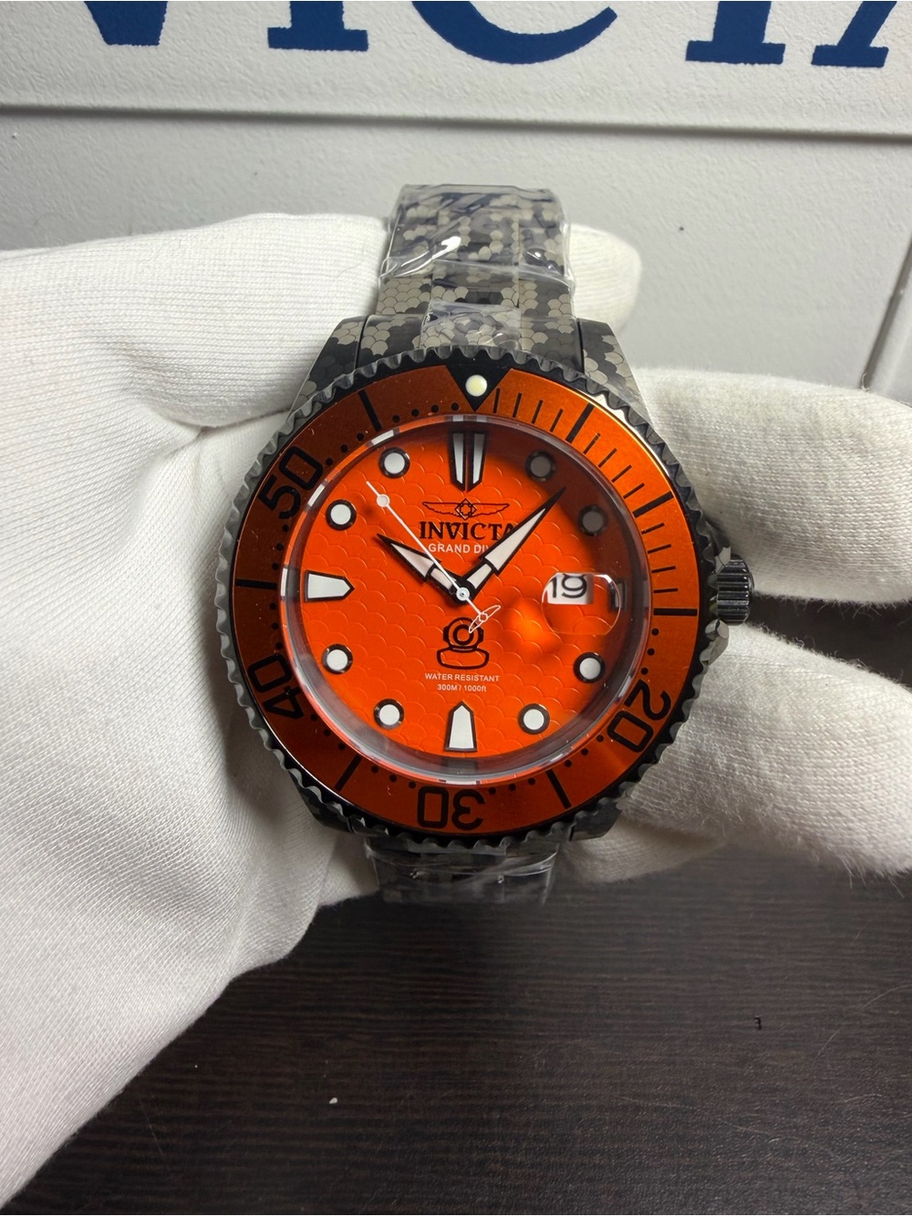 Invicta Orange Dial Dive Watch with Patterned Strap